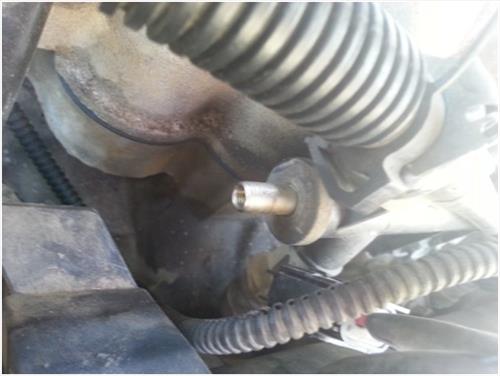 1998 ford taurus se fuel filter location