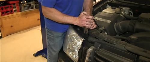 How To Install Replace Headlight and Change Bulb 2002-09 GMC Envoy step 4